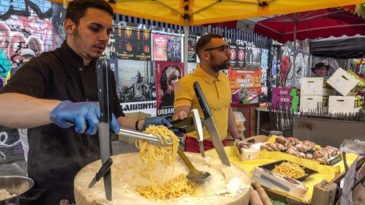 Italian Soft Fresh Spaghetti Savoured in a Cheese Wheel. London Street Food