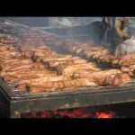 Italy Street Food Event. Ribs, Sausages, Melted Cheese with Ham, Huge Filled Burgers, Skewers