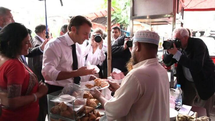 France’s Macron samples local food in Bangladesh, takes boat trip | AFP